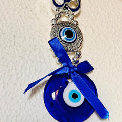 🔱 Divine Protection Combo – Golden Trishool-Damroo with Om & Rudraksha Idol + 🧿 Om Evil Eye Wall Hanging